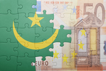 puzzle with the national flag of mauritania and euro banknote