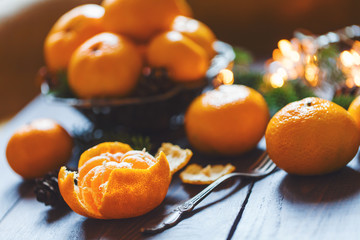 Plate with orange mandarins, Christmas or New Year concept