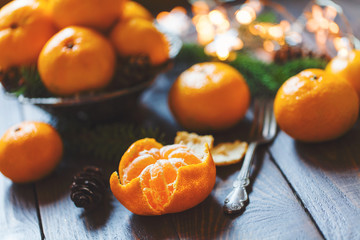 Plate with orange mandarins, Christmas or New Year concept