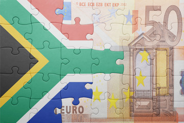 puzzle with the national flag of south africa and euro banknote