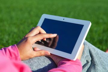 table pc in a hand for a girl