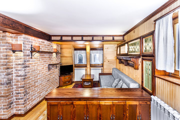 Traditional wooden interior with table and fixtures - mountain r