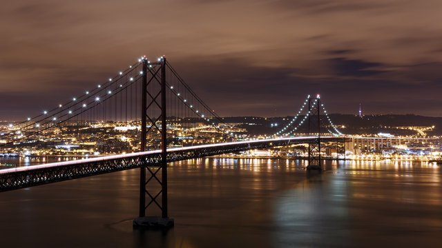 Night view of Lisbon and 25th of April Bridge, Portugal