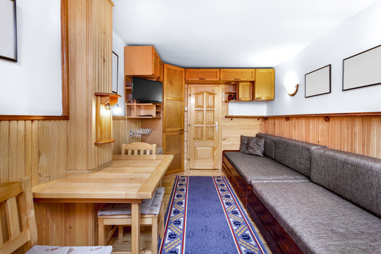 Traditional wooden interior with table and fixtures - mountain r
