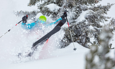 Fototapeta premium Man freerideer running downhill in forest