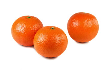 Three studio isolated mandarins on white background