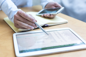 Accounting on a tablet computer, close-up