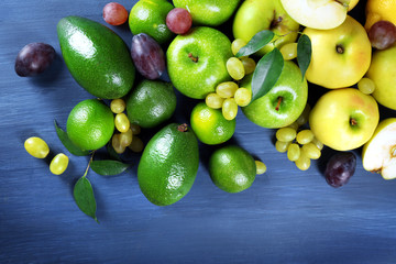 Fruits on dark blue wooden background