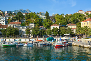 Fototapeta na wymiar View of the waterfront and the port Herceg Novi.