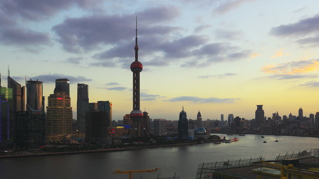 Panning time lapse of Shanghai from dusk to night.