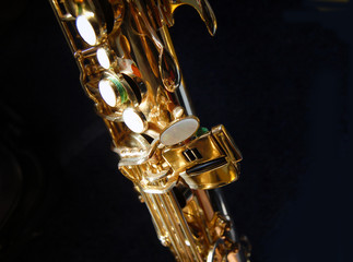 Tenor saxophone close up with black background