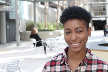 pretty african american college student on campus