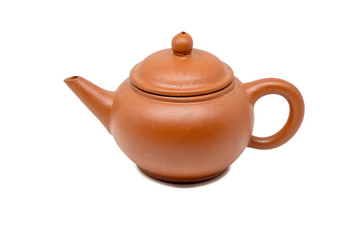 Close up of brown teapot isolated on white