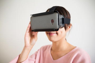 Young Woman use of the vr device