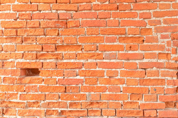 Obraz premium Ancient cut away brick wall with hole background 