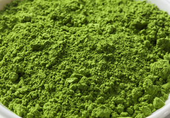 Obraz premium Green Tea powder on the plate