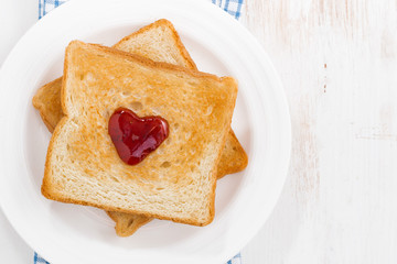 toast with jam in the shape of a heart for Valentine's Day