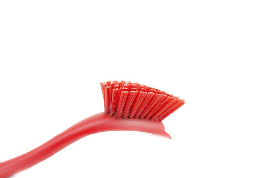 red cleaning brush isolated on white background