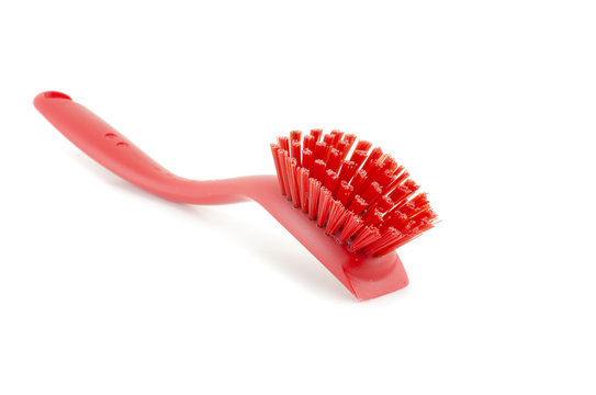 red toilet brush isolated on white background