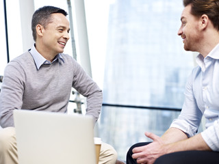 office people talking chatting discussing during break