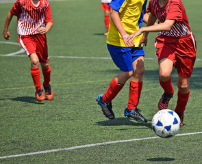 Naklejka premium Children are playing soccer