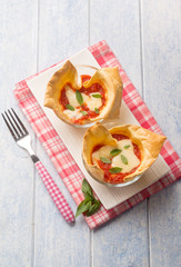creative little lasagne on glass bowl