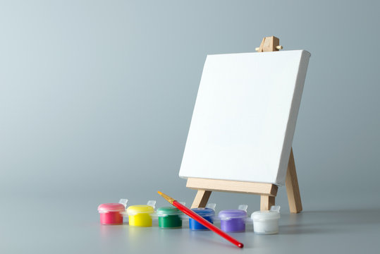Painting easel with empty canvas