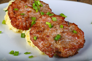 Cutlet with mushed potato