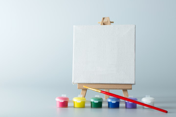 Painting easel with empty canvas