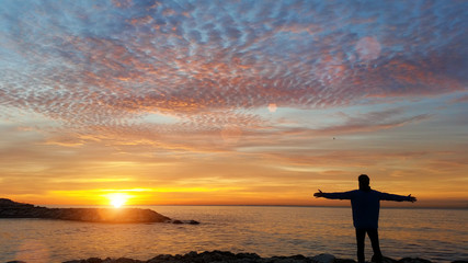 Man watching sunrise