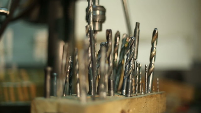 Drill set for metal in a wooden mount
