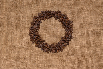 coffee beans brown burlap fabric Natural texture close a lot of grain rustic warmth