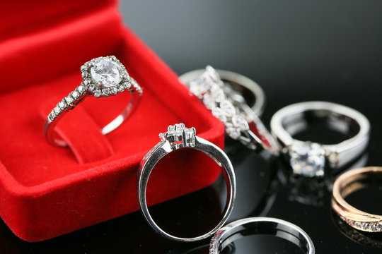 Wedding rings background, beautiful silver ring in red box for wedding concept.