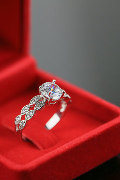 Wedding rings background, beautiful silver ring in red box for wedding concept.