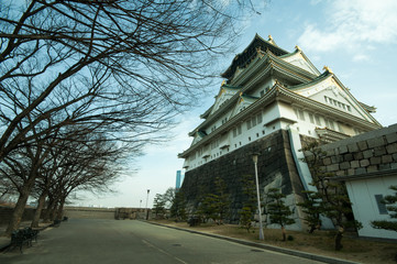 Osaka castle with morning light / Osaka castle with nature background at morning time