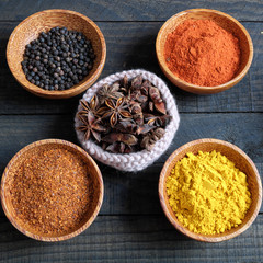 Colorful spice powder, chilli, pepper, turmeric, cashew