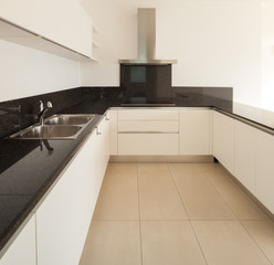 interior of new apartment, empty living room, tiled floor