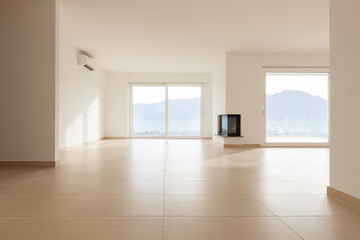 interior of new apartment, empty living room, tiled floor