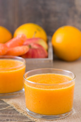 Smoothie with orange, apple and carrots
