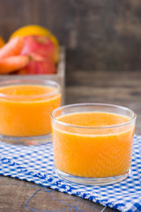 Smoothie with orange, apple and carrots
