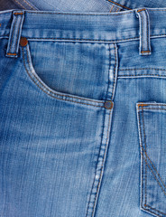 Blue jeans fabric with pocket background.