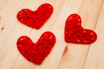 Valentines Day background. Knitted hearts