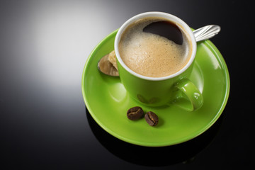cup of coffee on black