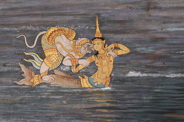 the Ramayana painting on the wall in public temple in thailand