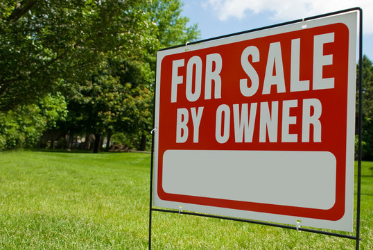 For Sale By Owner Sign in Yard