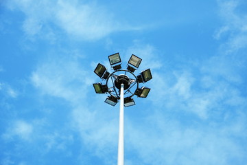 Blue-sky and white cloud and Lamp post spot light