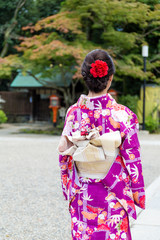 The back view of Young Woman waering the kimono