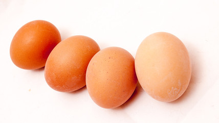 4 eggs on white background.