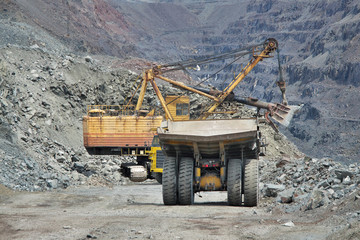 Excavator loading iron ore