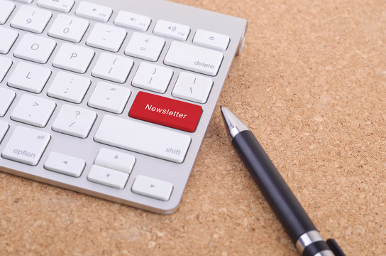 Business concept: computer keyboard  and business pen with word